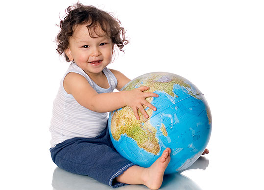 happy baby with globe